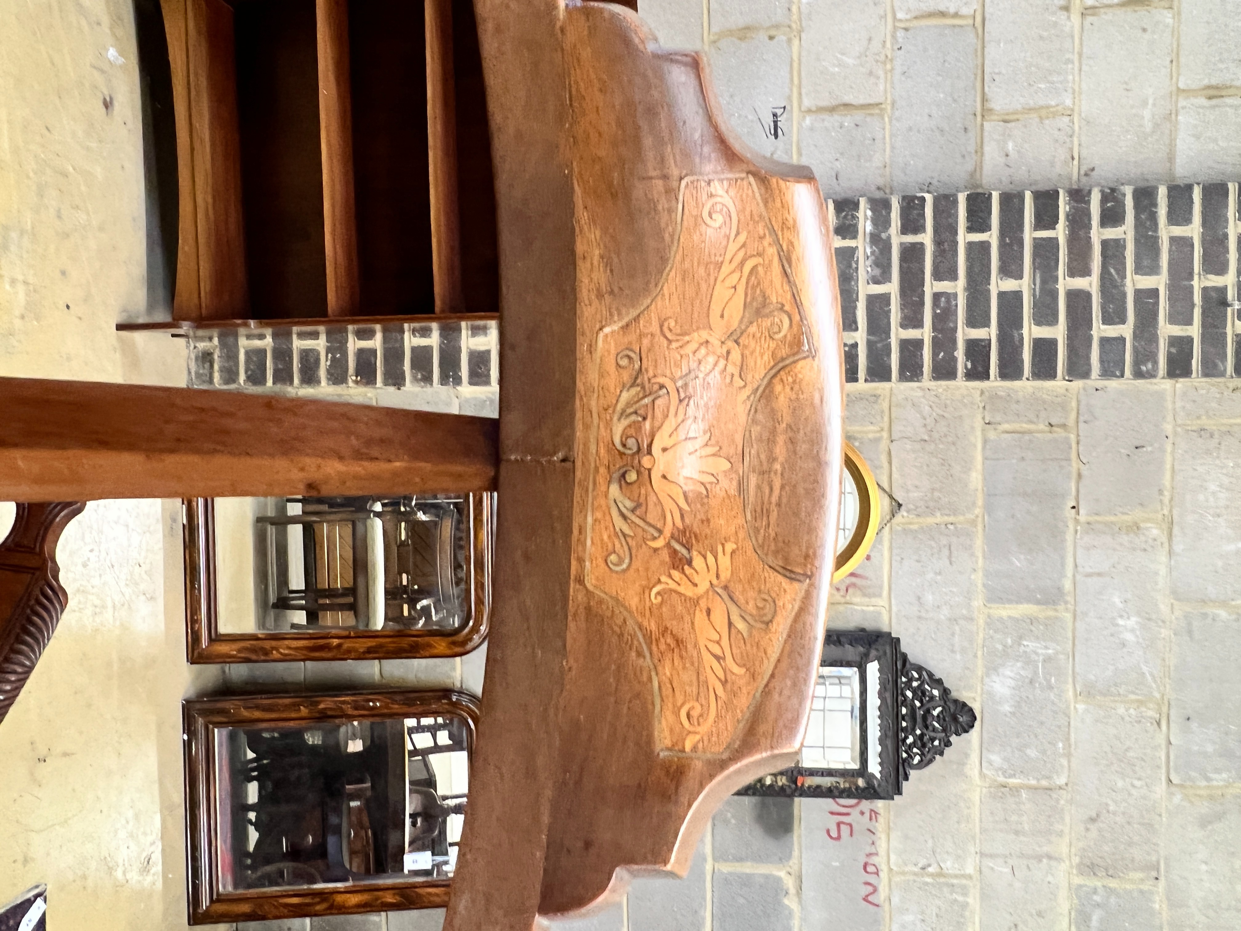 A pair of Edwardian inlaid mahogany corner elbow chairs